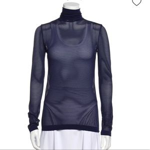 Wolford Sheer striped turtleneck top.